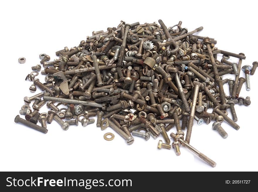 Many small old screws in a pile on white background. Many small old screws in a pile on white background