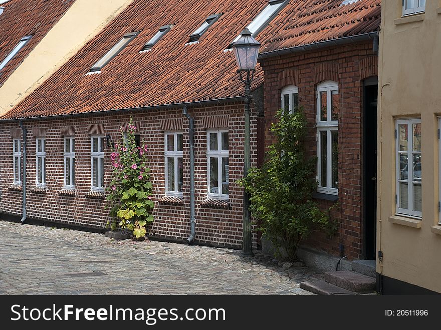 Street with old houses from royal town Ribe in Denmark.