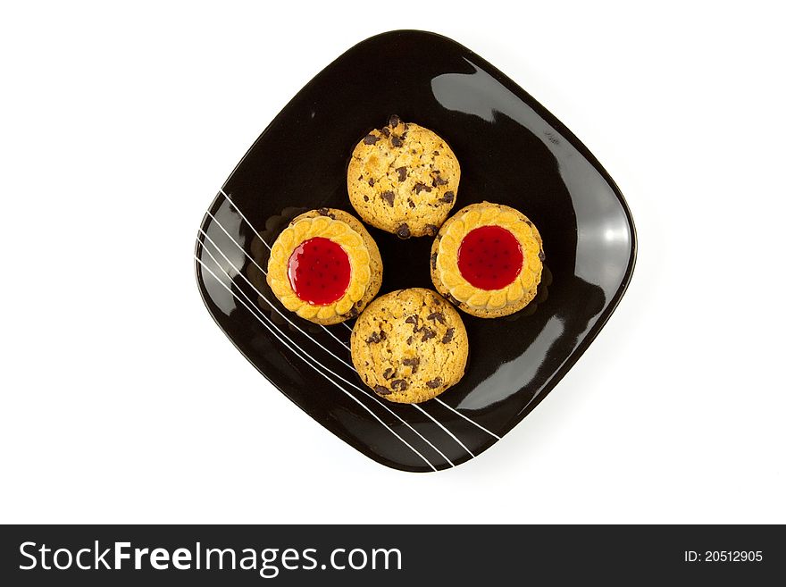 Plate of cookies isolated on white background