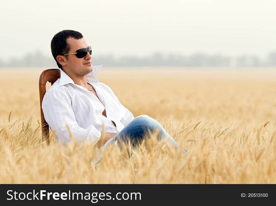 Man in golden summer corn field. Man in golden summer corn field