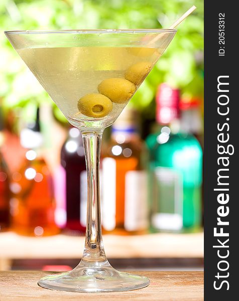 Alcohol cocktail martini with olives