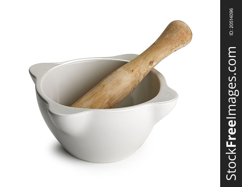 White mortar and wooden pestle