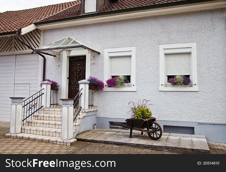 One story house with flowers decoration