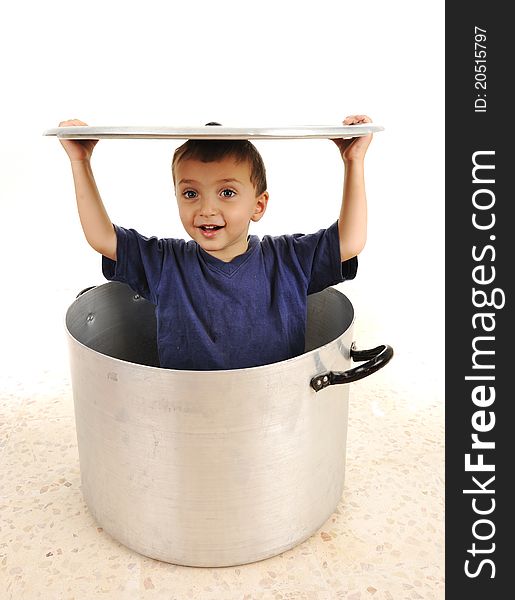 Cute child in pot, playing