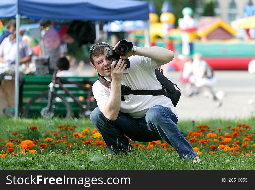 Photographer during shooting in Almaty. Almaty are the major commercial center of Kazakhstan.