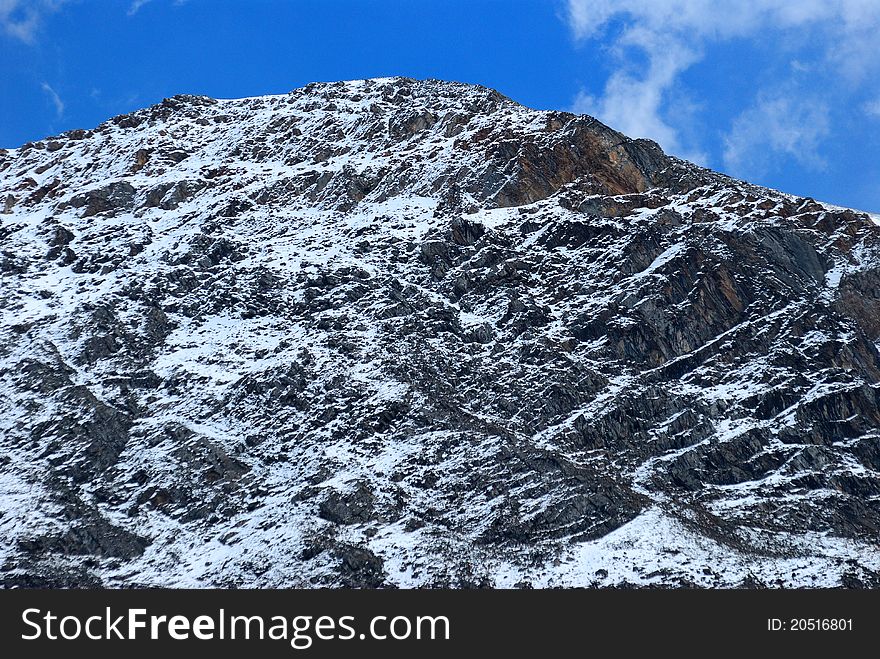 Snow mountain at blue sky background