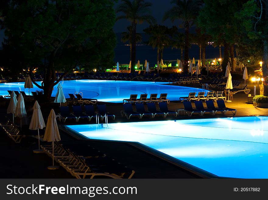 Hotel and resort swimming pool at night