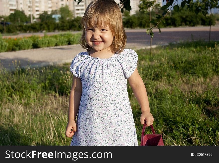 Portrait of little girl outdoors