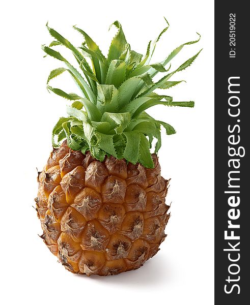 Whole fresh pineapple on the white background