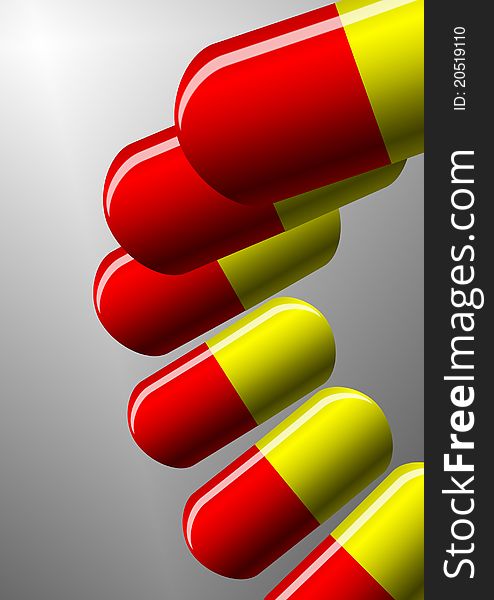 A number of red and yellow tablets on a white background. A number of red and yellow tablets on a white background