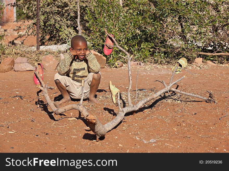 Poor African little boy from Mochudi village, Botswana