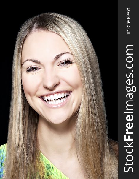 Portrait of beautiful young woman with long straight hair on black background. Portrait of beautiful young woman with long straight hair on black background