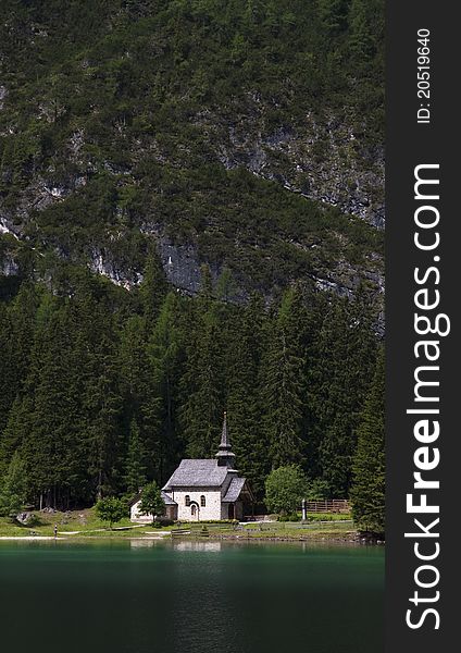 Small chapel at the mountain lake in Southern Tirol.