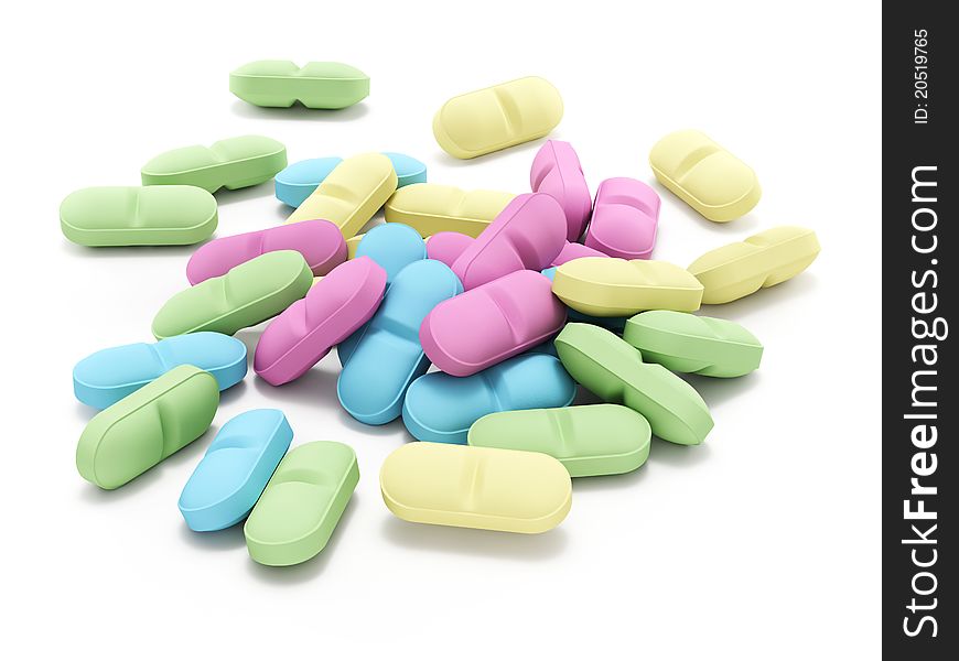Many colored pills on white background