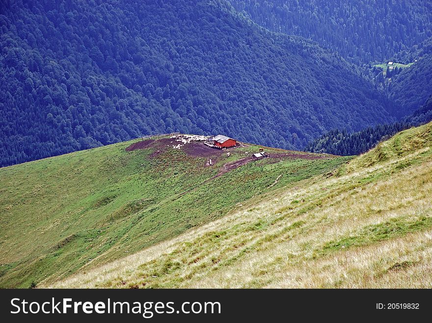 Mountain landscape with sheepfold shelter