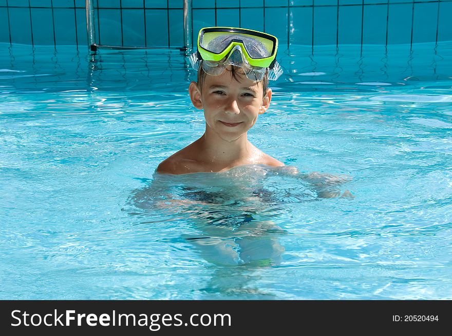 Cute boy wearing in yellow goggles