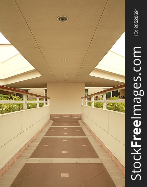 Long corridor between building decorated with beautiful tiles