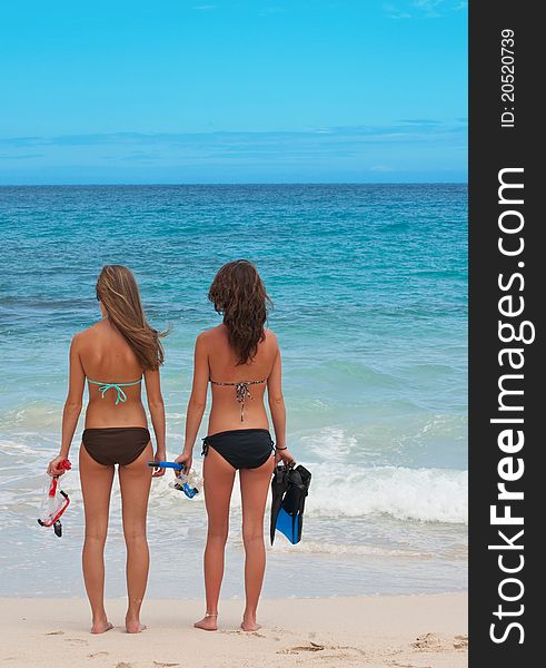 Two young women snorkeling at the beach. Two young women snorkeling at the beach