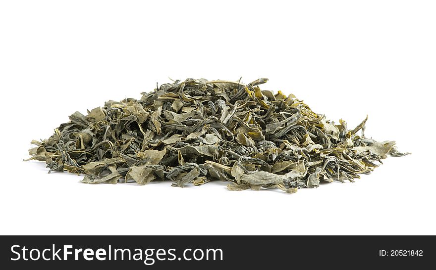 Dried green tea leaves isolated on white