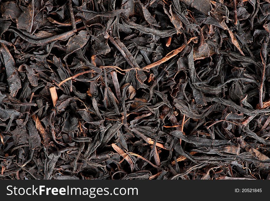 Dry black tea leaves closeup