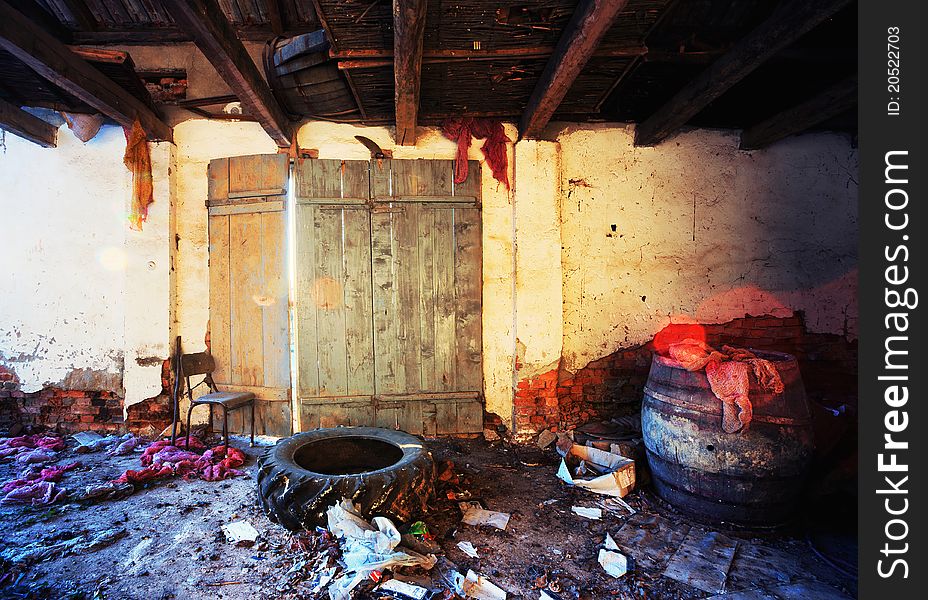 Interior of a ruined house with garbage and old ruined furniture. Interior of a ruined house with garbage and old ruined furniture.