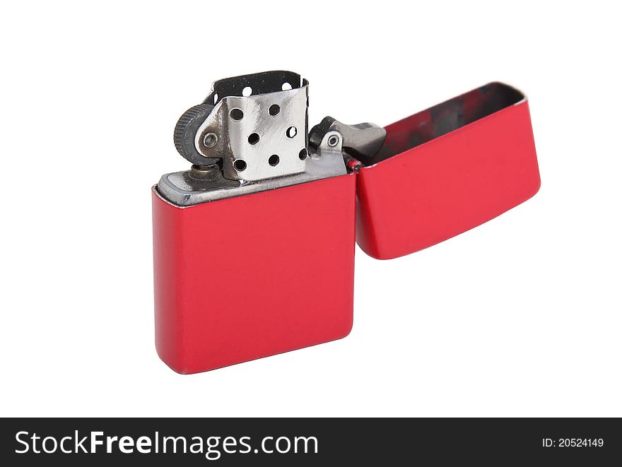 Red metal lighter isolated on a white background