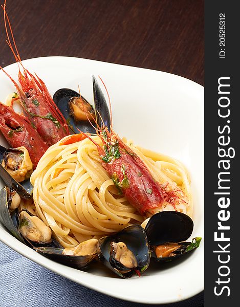 A plate of italian spaghetti with fresh seafood. A plate of italian spaghetti with fresh seafood