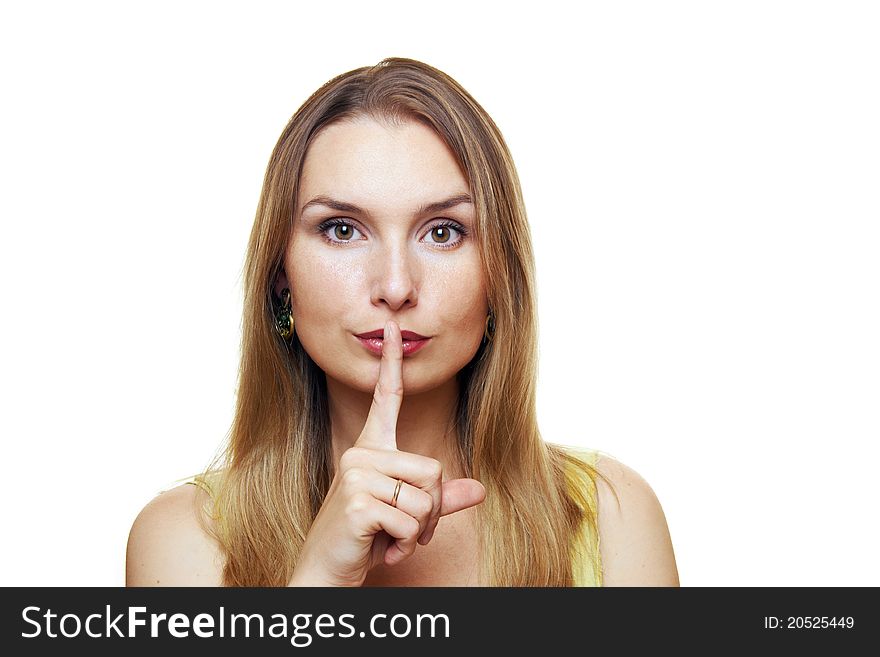 Young Woman Gesturing for Quiet. Isolated.