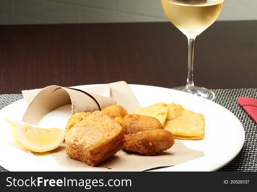 Tradional sicilian fried panelle and croquettes with salt