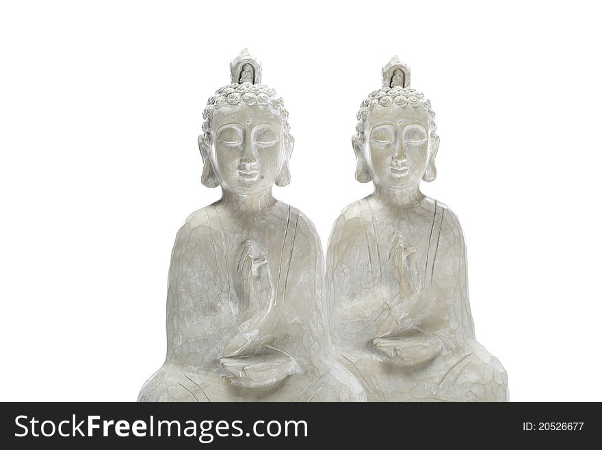 Two white budha statues made out of wood. Two white budha statues made out of wood