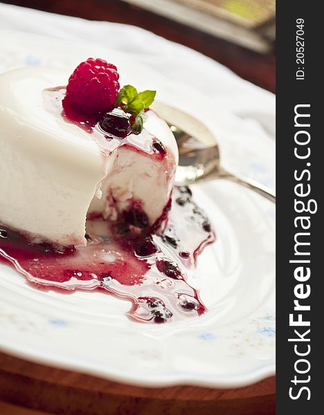 Italian panna cotta dessert with fresh berries