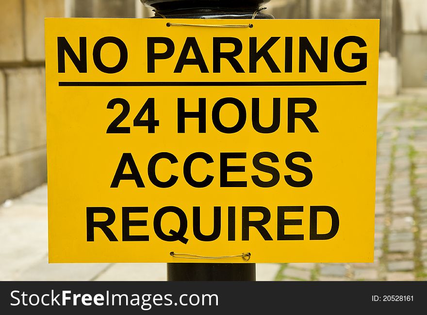 A sign indicating that parking is not allowed 24 hours per day. A sign indicating that parking is not allowed 24 hours per day