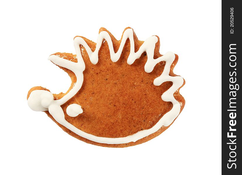 Gingerbread cookie in the shape of hedgehog - cut out on white