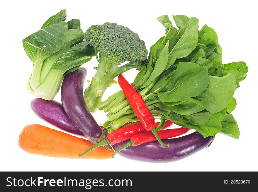 Assortment Of Green Vegetables, Carrots, Chili And Eggplants. Assortment Of Green Vegetables, Carrots, Chili And Eggplants