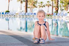 Beautiful Girl At The Swimming Pool Stock Images