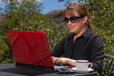 Smiling Business Woman Working On Laptop. Royalty Free Stock Photos Smiling Business Woman Working On Laptop. Royalty Free Stock Photos