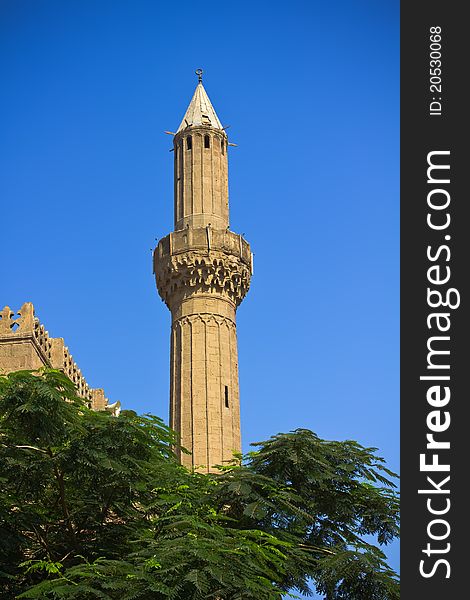 The minaret of ancient mosque in Cairo.