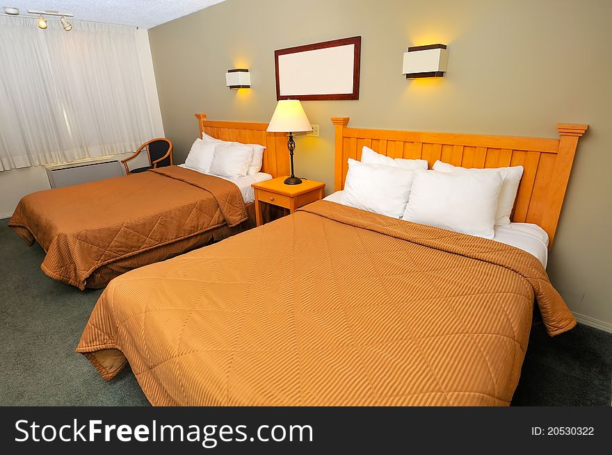 Spacious and high class looking hotel bedroom for relaxation. Spacious and high class looking hotel bedroom for relaxation.