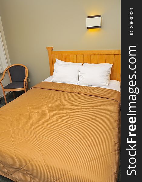 Simple looking generic single bed with clean bedsheets. Simple looking generic single bed with clean bedsheets.