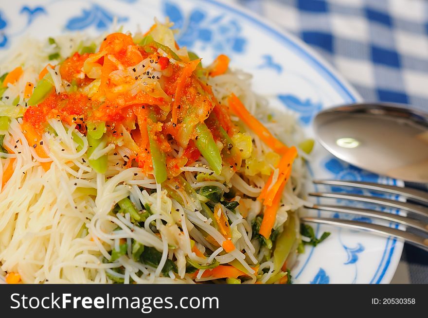 Healthy Chinese style vermicelli topped with spicy seasonings. Healthy Chinese style vermicelli topped with spicy seasonings.