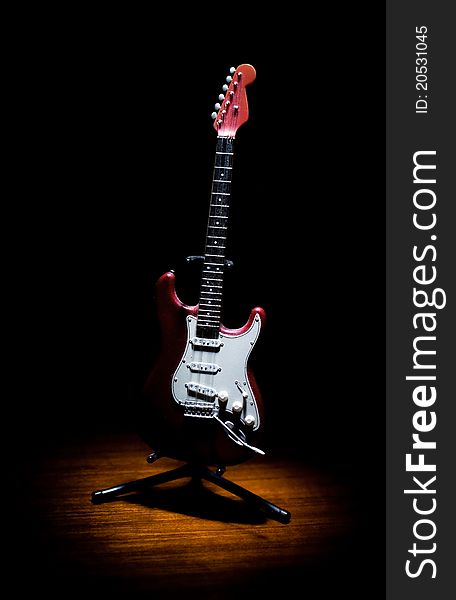 Old red electric guitar model. Old red electric guitar model