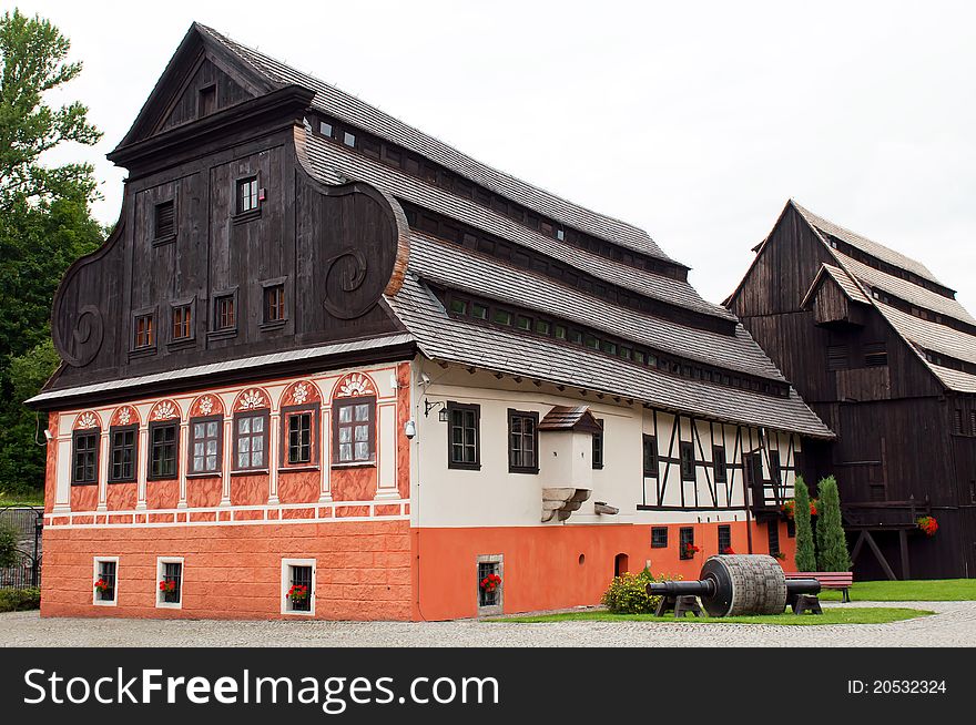 Beautiful historic log house during the daytime.