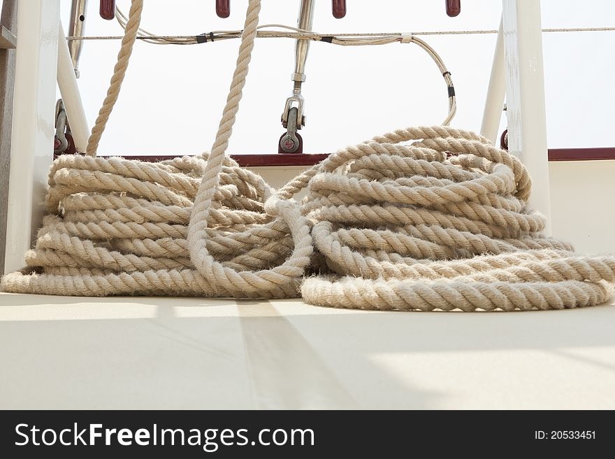 Rope rigging on a sailboat deck.