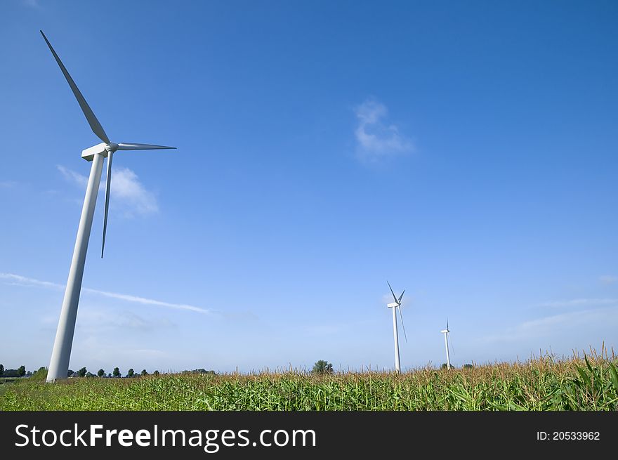 Wind Turbines In Green Field