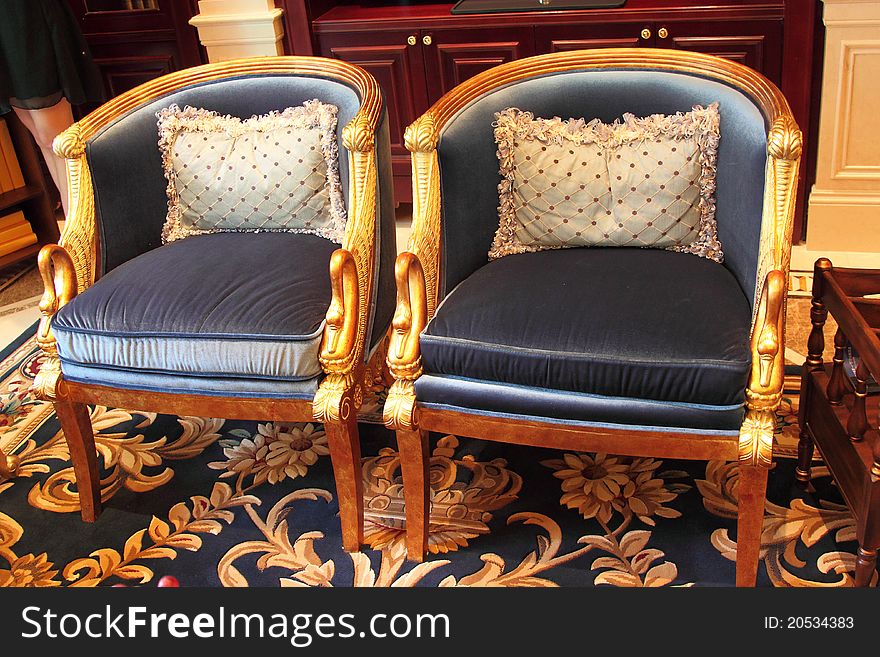 Beautiful and decorative chair sitting on carpet and/or tile floor. Beautiful and decorative chair sitting on carpet and/or tile floor
