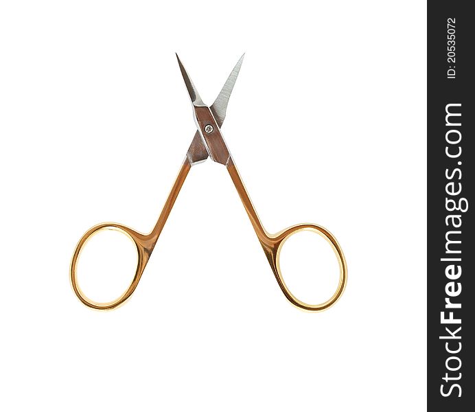 Golden manicure scissors isolated on white background with clipping path. Golden manicure scissors isolated on white background with clipping path