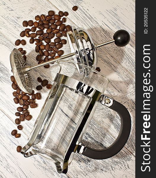 Coffee Cafetiere with Spilt coffee beans. Coffee Cafetiere with Spilt coffee beans
