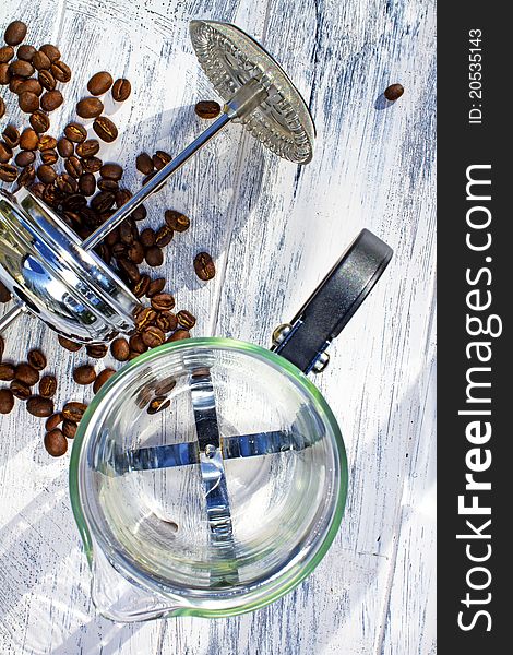 Coffee Cafetiere with Spilt coffee beans. Coffee Cafetiere with Spilt coffee beans