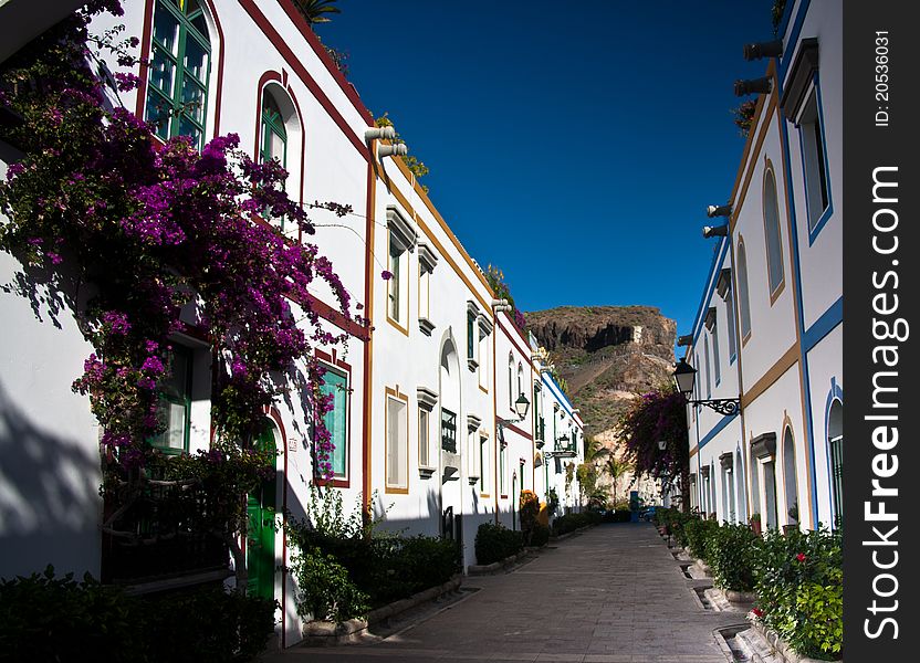 A pedestrian street in the fishing village of Puerto Mogan on Gran Canaria, Canary  Islands, Spain. A pedestrian street in the fishing village of Puerto Mogan on Gran Canaria, Canary  Islands, Spain