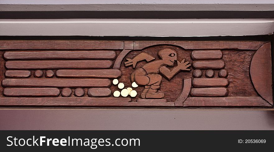 Carved molding on a house in Celle, Lower Saxony, Germany which shows that the owner has a unique skill at making money from gold coins. Carved molding on a house in Celle, Lower Saxony, Germany which shows that the owner has a unique skill at making money from gold coins.